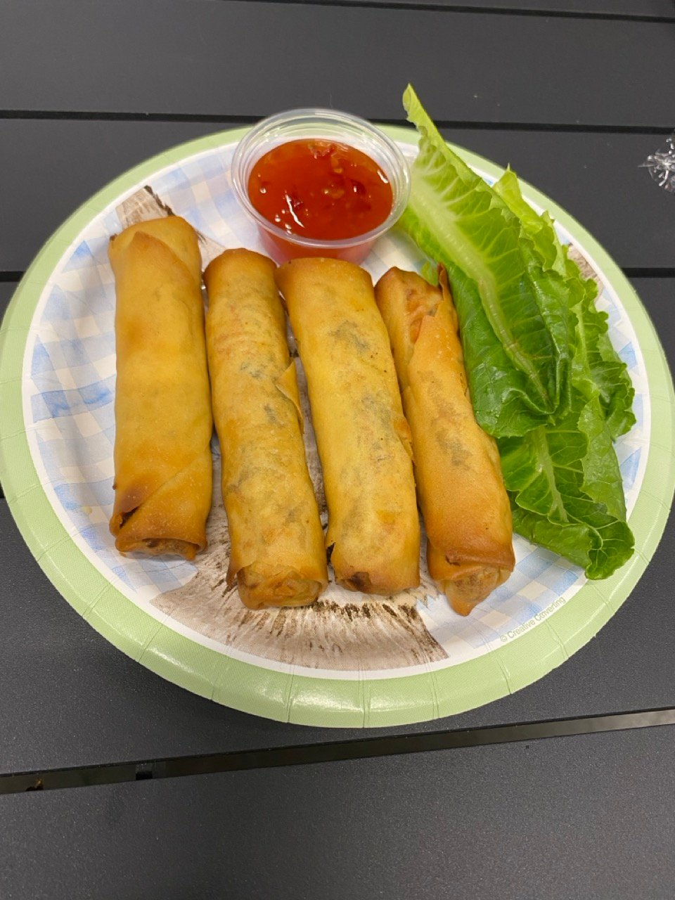 Vietnamese Bánh Mì at Wrap N Roll Saskatoon — crispy Vietnamese-style baguette with butter, pâté, pork roll, carrots, cucumber, cilantro and chili